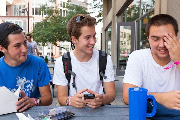 Three young men hanging out.